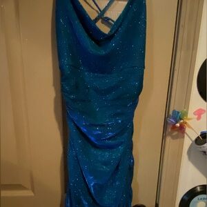 Homecoming dress, tight fit, only worn once, cross over straps in the back.